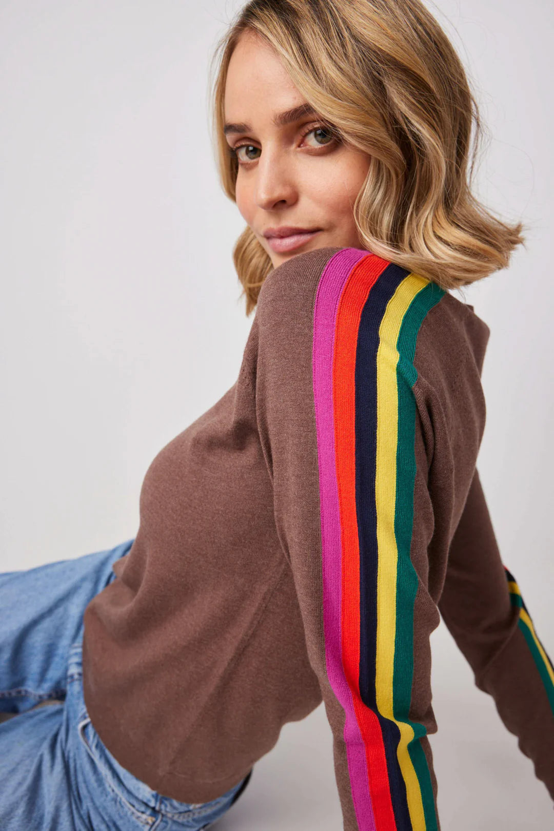 Striped sleeve sweater discount